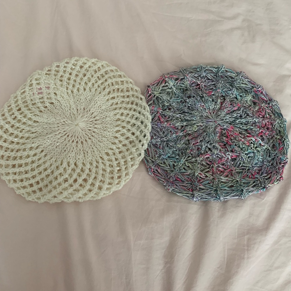 White and grey multicolored Berets.